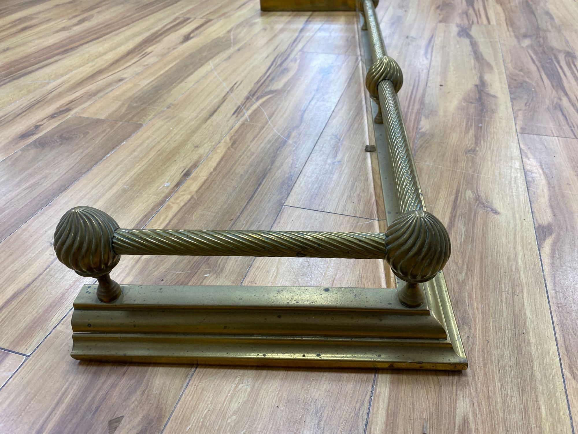 A Victorian brass kerb, length 133cm